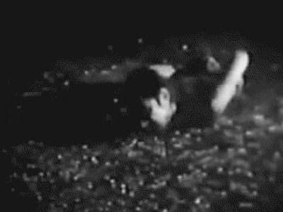 Chris-Burden---Through-The-Night-Softly-(1973)